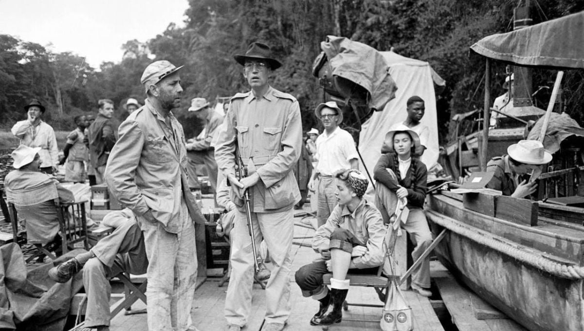 On location shooting The African Queen (1951).