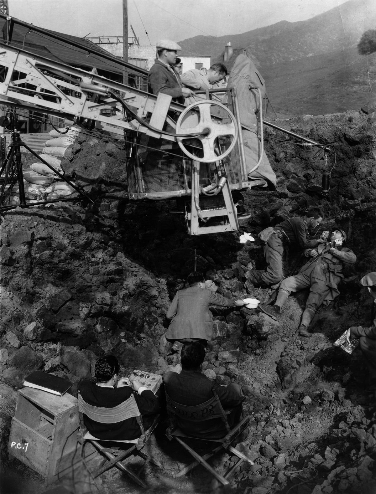 Angling in on a crane, Arthur Edeson, ASC behind the camera.