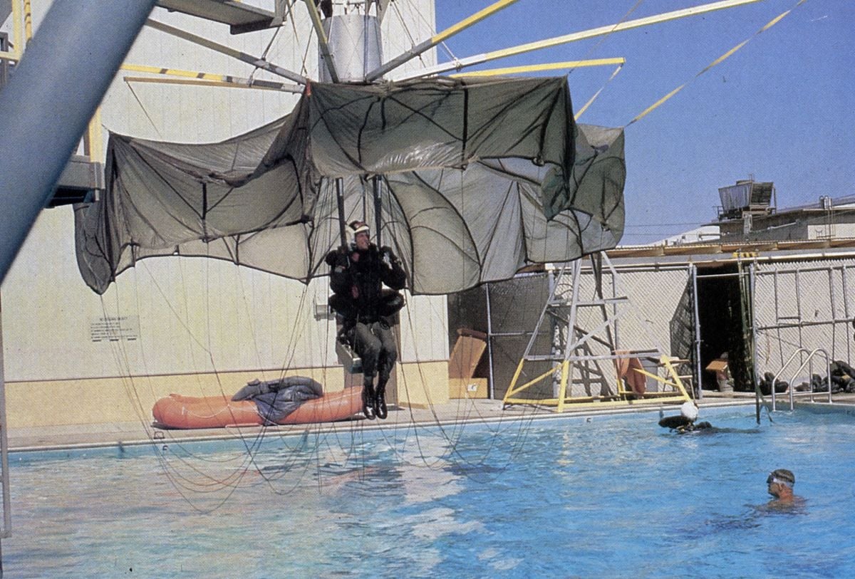 How to land in water using a parachute. (Photo by Ralph Nelson/Paramount)