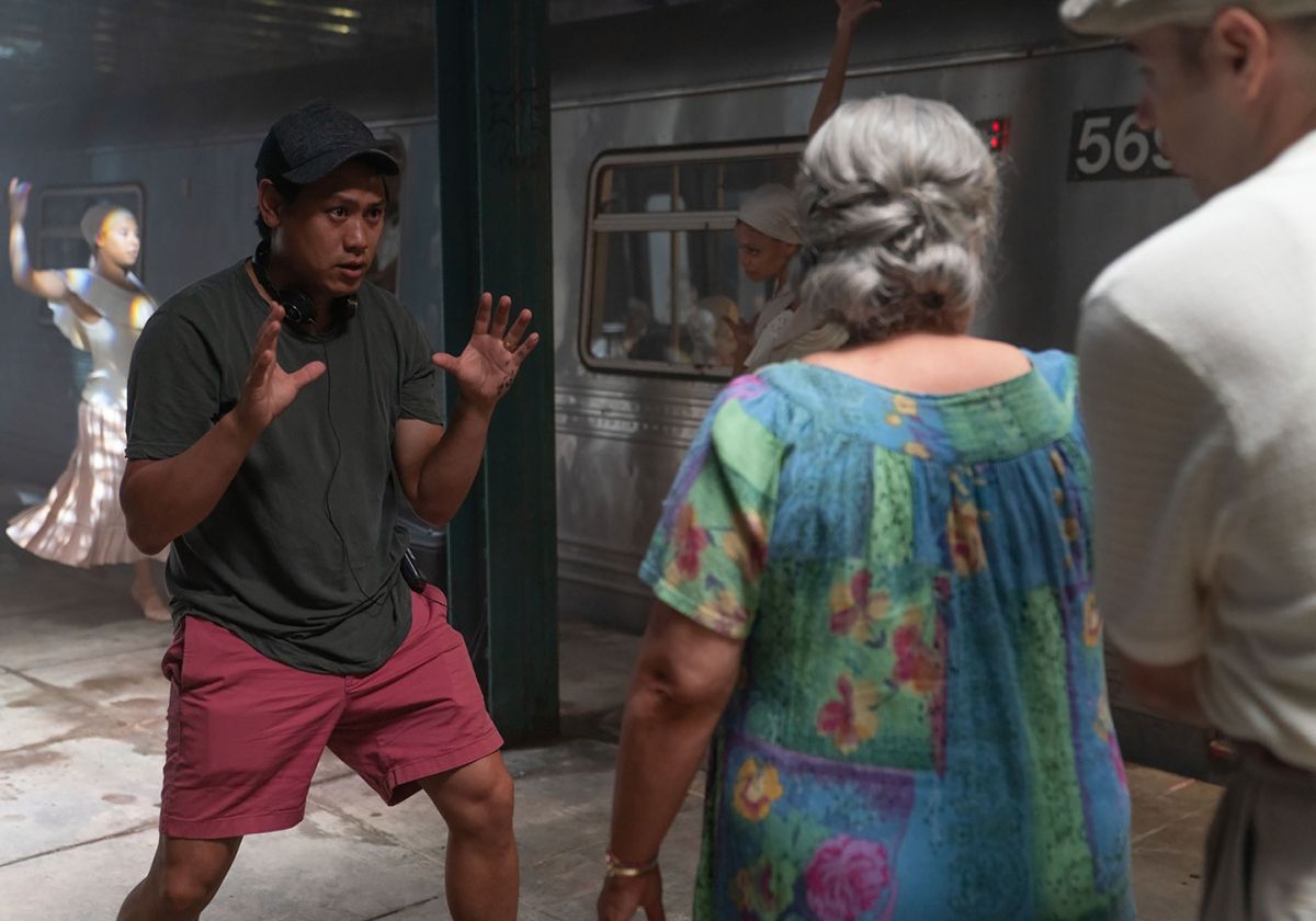 In the phantasmagorical musical sequence “Paciencia y Fe,” set in a subway, Abuela Claudia (Olga Merediz) reflects on her life as an immigrant from Cuba.