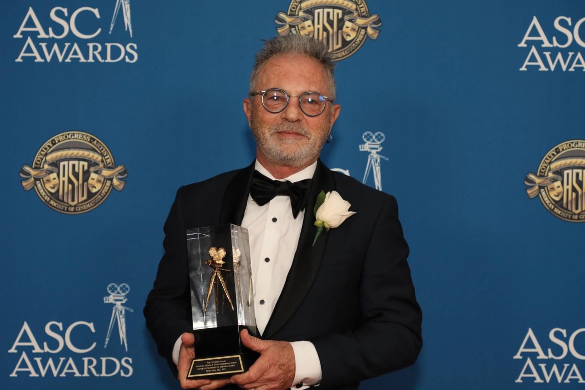 Levy with his ASC Career Achievement in Television Award, which was presented to him by longtime friend Hopkins.