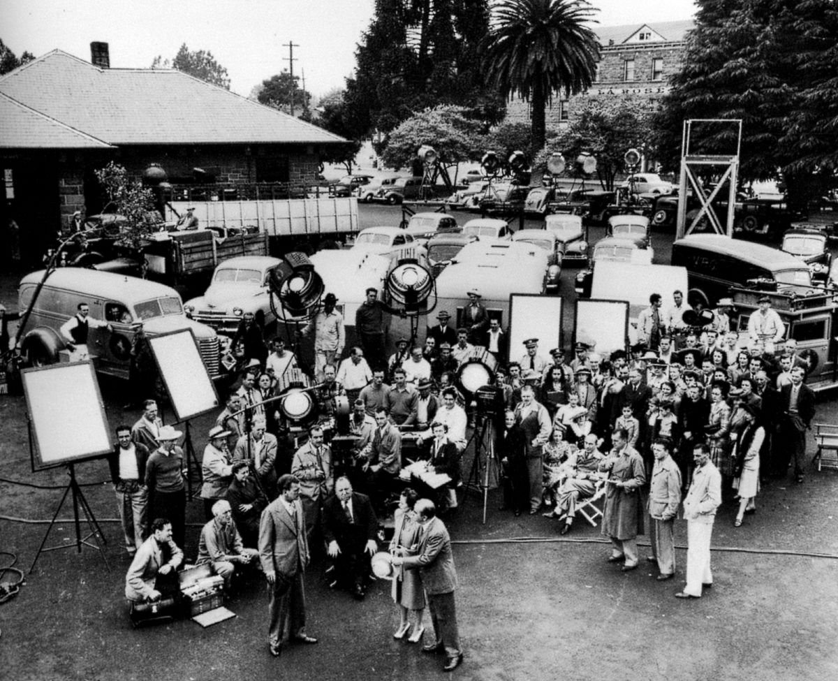 The production crew on location in Santa Rosa, with director Alfred Hitchcock and DoP Joseph A. Valentine front positioned right up front.