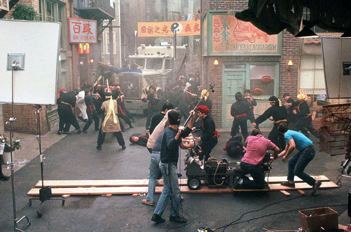 Sets designed by John Lloyd, reflect careful attention to detail resulting in accurate Chinatown backgrounds, all built indoors to facilitate atmospheric effects.