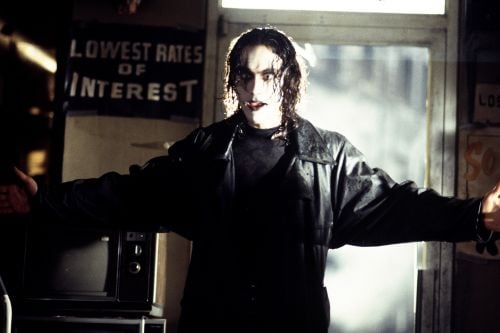 Eric Draven (Brandon Lee) makes his first public appearance as The Crow in a seedy pawnshop.
