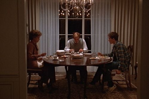 The Jarrett family — Beth (Mary Tyler Moore, left), Calvin (Donald Sutherland, center) and Conrad (Timothy Hutton) — share an evening meal.