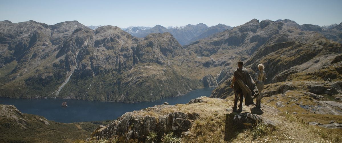 In Episode 7, Galadriel (right) and Arondir (Ismael Cruz Córdova) observe from on high the aftermath of a disastrous battle between the Númenor army and the Orcs.