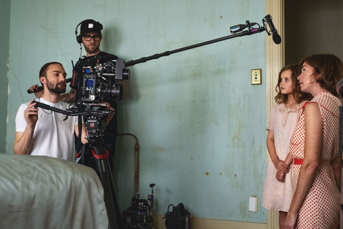 Irvin and boom operator Ben Greaves film a scene involving young Norma Jeane (Lily Fisher) and her mother, Gladys (Julianne Nicholson).