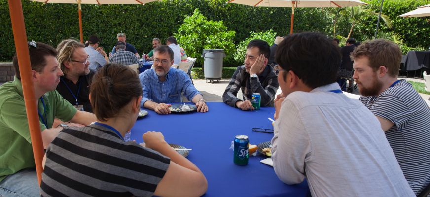 Instructor M. David Mullen, ASC (center, wearing blue shirt), joins Master Class participants on the Clubhouse lawn.