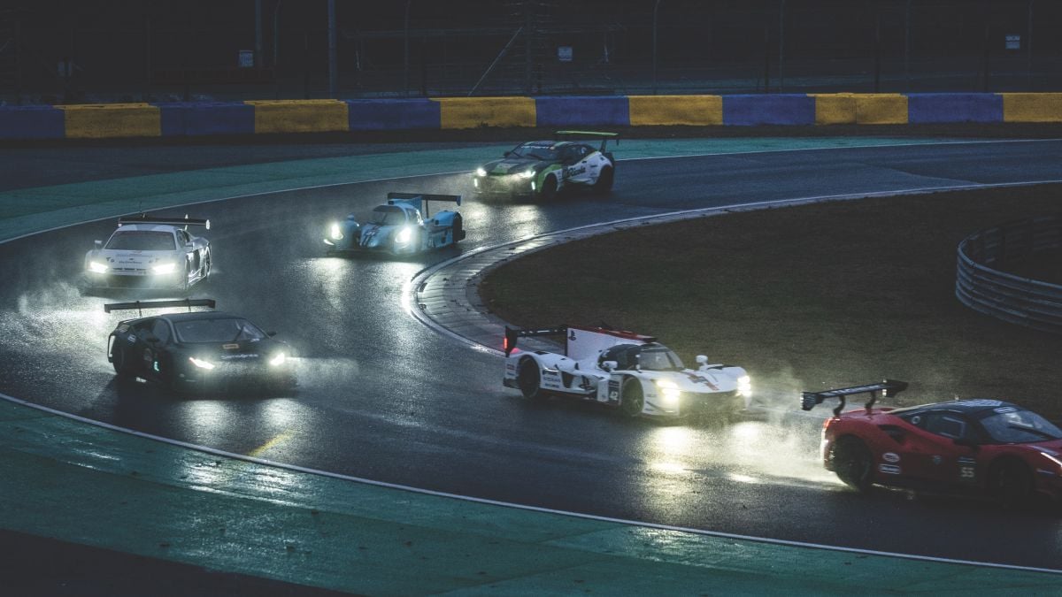 A nighttime racing scene raises the stakes with perilous rainfall.