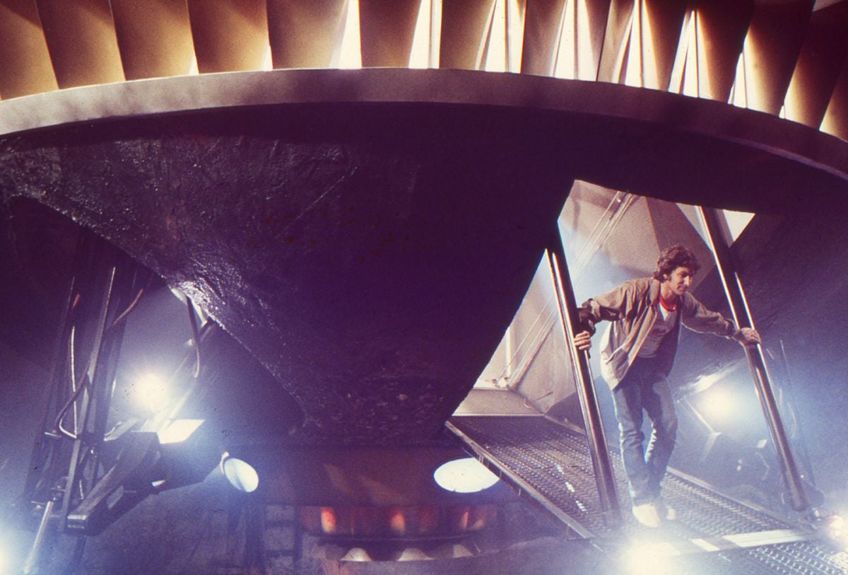 Spielberg steps out of ET's spacecraft on stage at Culver Studios.