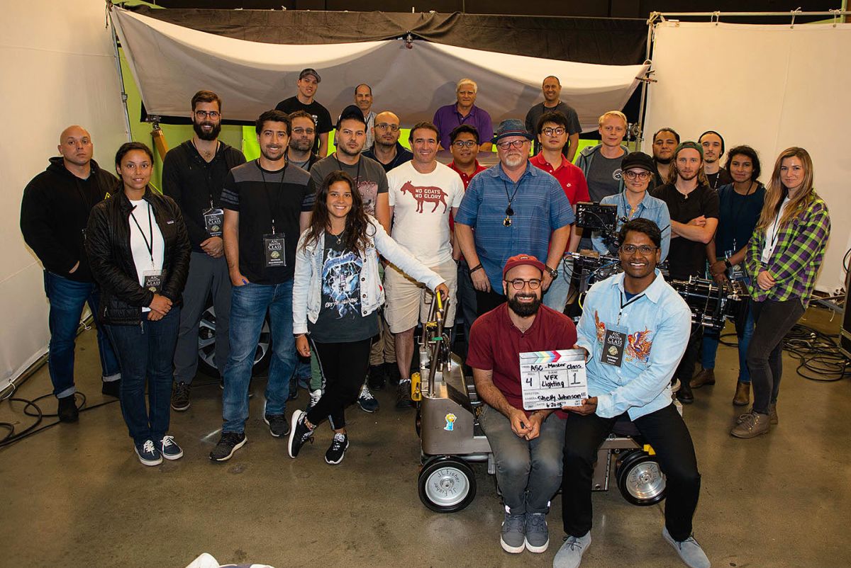 ASC instructor Shelly Johnson (center in blue shirt) with the assembled class.