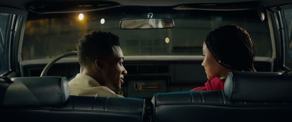 Kahlil (Algee Smith) and Starr (Amandla Stenberg) share a romantic moment in a car shortly before Kahlil is killed.