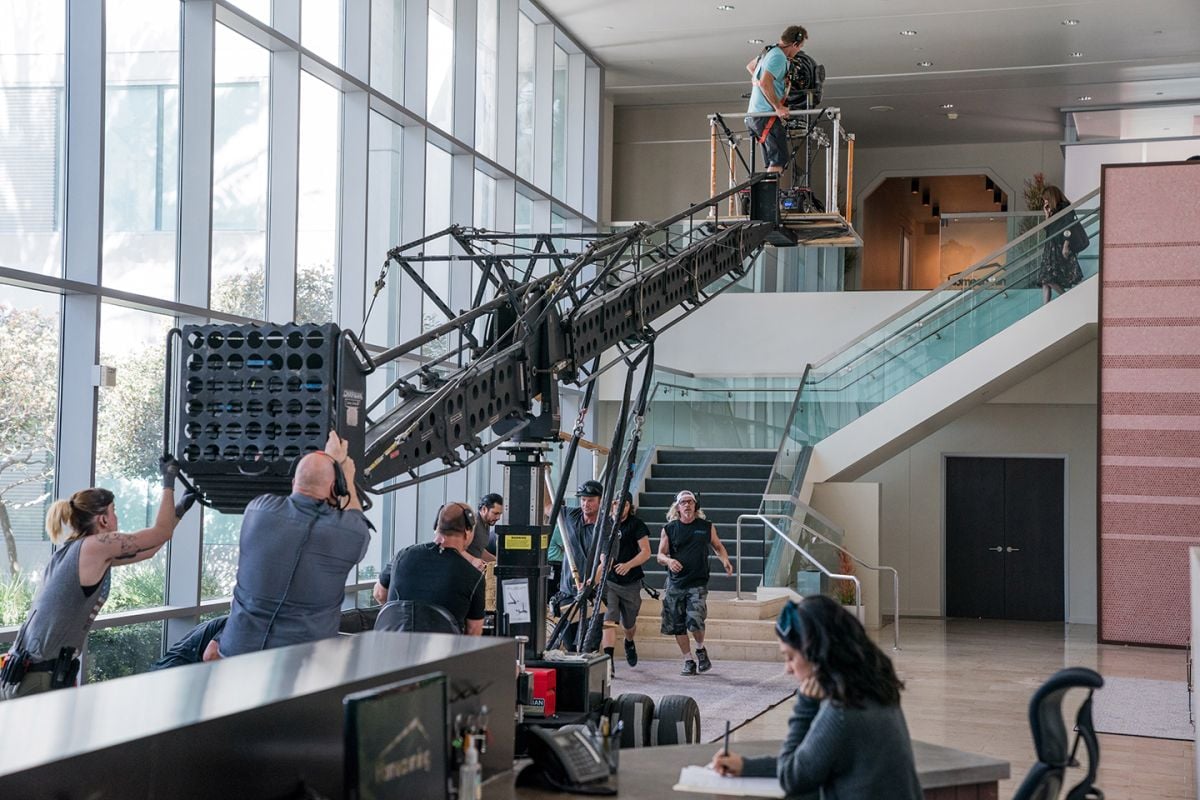 To follow Roberts as she descended the lobby stairs, the crew tracked a dolly onto a platform that had been rigged onto a crane, which then brought the camera down to ground level.
