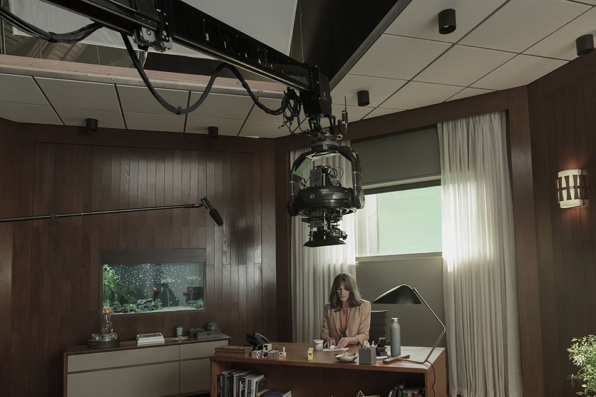 The camera is craned into position for a high-angle shot above Bergman’s desk.