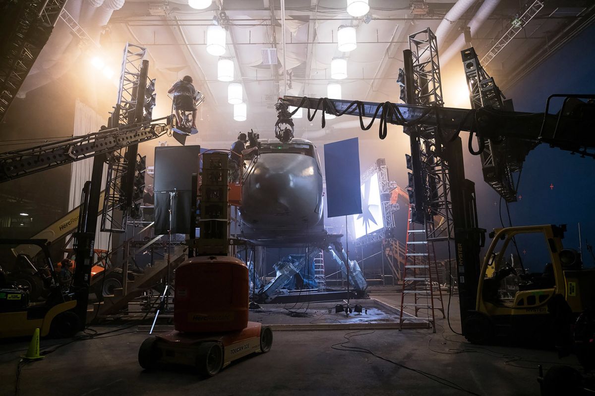 Multiple cameras angle in on the cockpit. Space lights hang above a gimbal-mounted Osprey aircraft set, and large LED panels provide interactive lighting to represent the monsters’ bioluminescence.