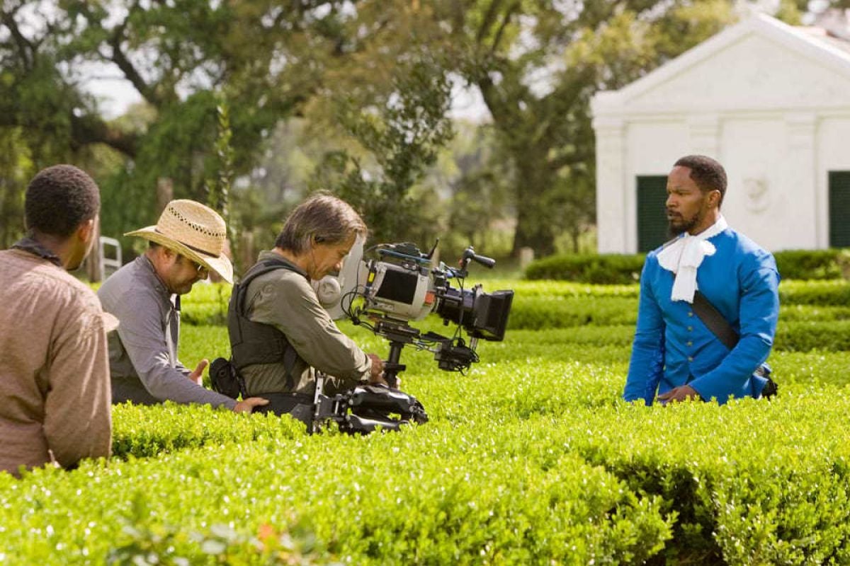 Steadicam operator Scott Sakamoto, spotted by Pershing, leads Foxx on a walk around Candieland.