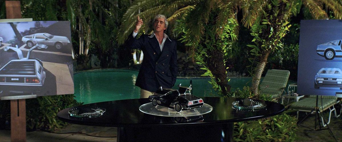 DeLorean makes a presentation during a party at his home.
