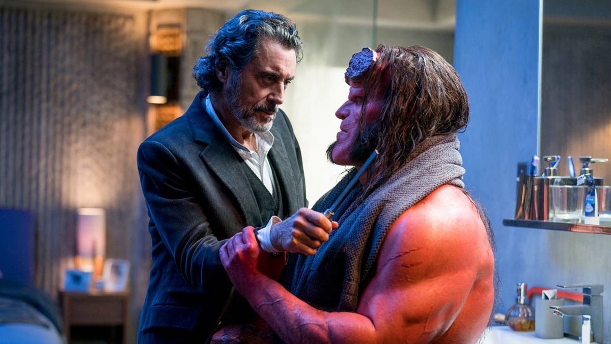 Hellboy and his adoptive father, Trevor Bruttenholm​​​ (Ian McShane).