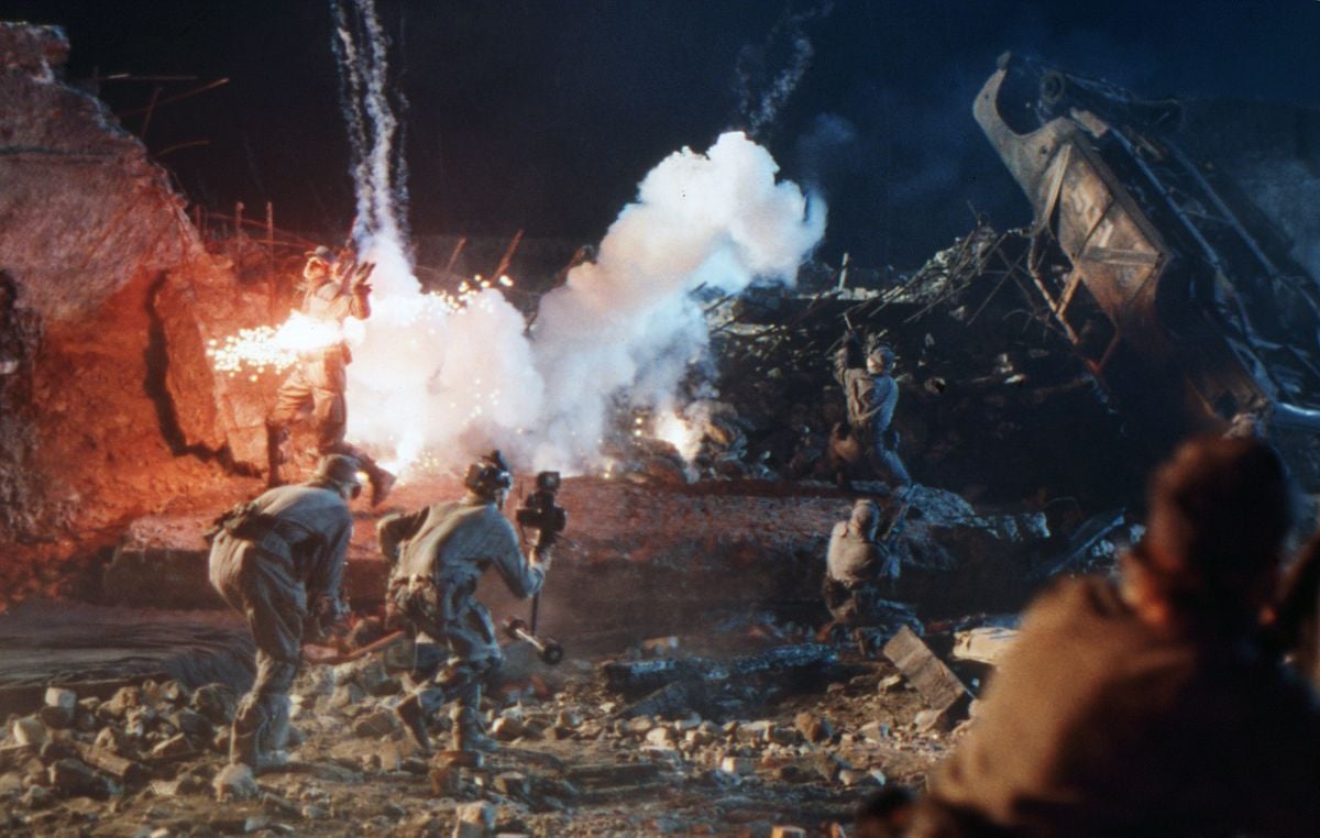 The camera tracks a soldier in the future war landscape — an abandoned industrial site located near Los Angeles.