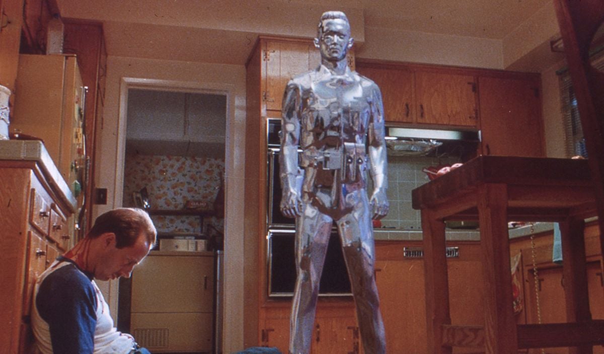 In this multi-part metamorphosis the T-1000 changes from the likeness of John's foster mother, Janelle — whose husband he has just murdered — back into the liquid form.
