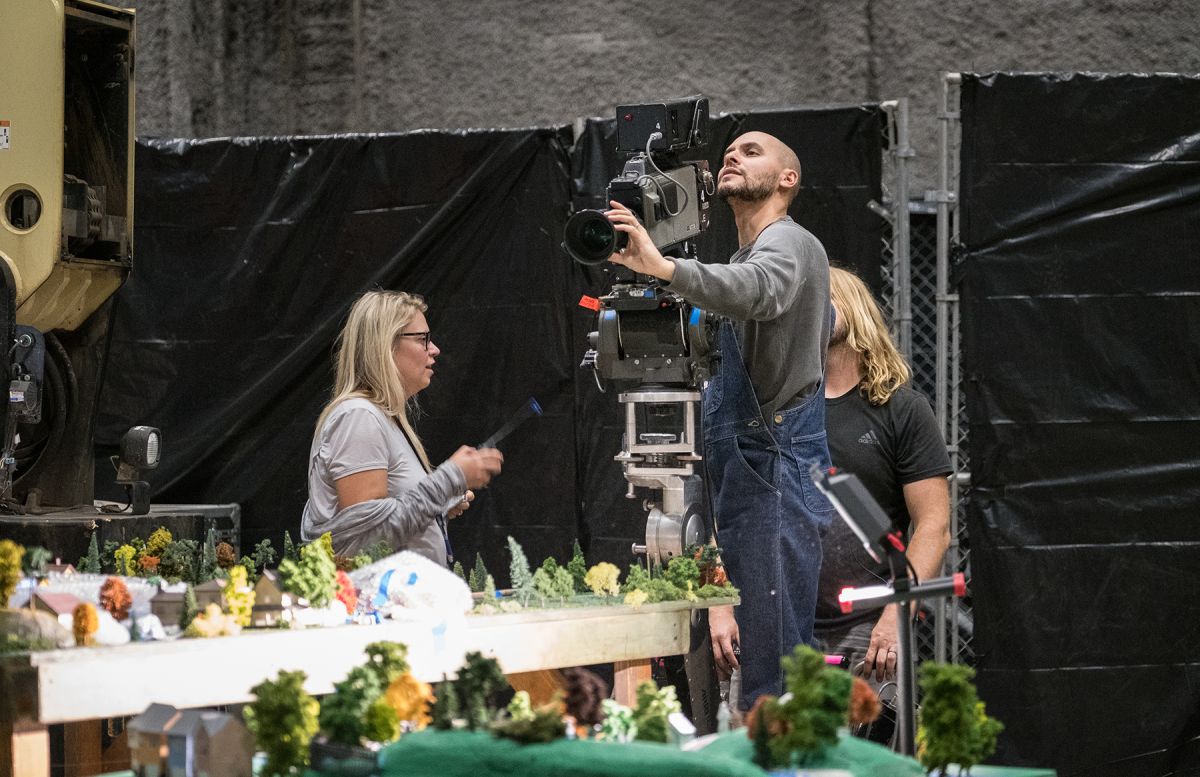 Lipes sets a shot on one of the film's elaborate tabletop miniatures, which replicate the aesthetic of Rogers' original show and serve as creative transitions.