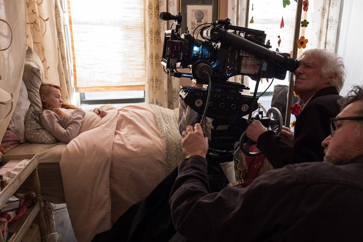 On location in Brooklyn, N.Y., Roger Deakins, ASC, BSC and 1st AC Andy Harris capture Theo’s visit to Pippa (Aimee Laurence, left), another young survivor of the bombing.