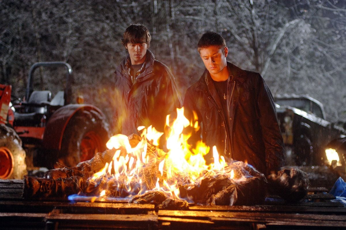 Sam and Dean torch cursed remains in the Season 1 episode “Route 666.” Ladouceur used fire effects — often just covered wagons with gels, controlled by dimmers — consistently throughout the series, either to bolster practical flames or create interactive flicker that will augment CG fire added in post.