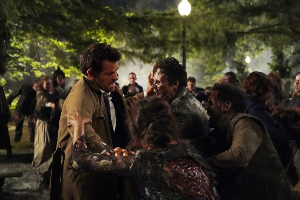 Castiel (Misha Collins) and the Winchesters are surrounded by the undead in the Season 15 episode “Raising Hell.”