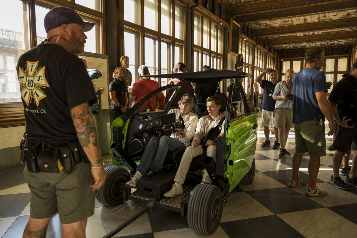 Cradling the camera, Bay lines up and EXCU on actor Dave Franco (“Six”) inside the cab mock-up while shooting at the Uffizi Gallery.