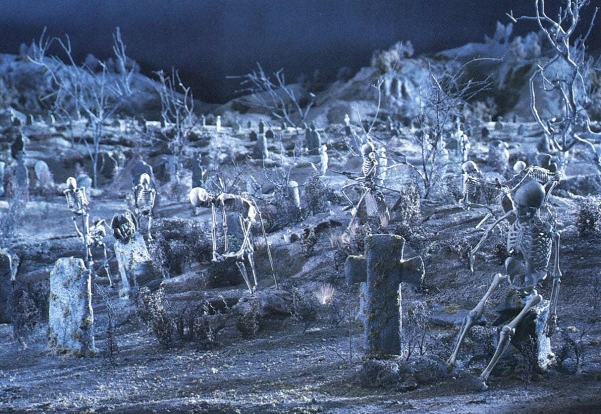 A closeup look at the miniature graveyard with its busy skeletons.