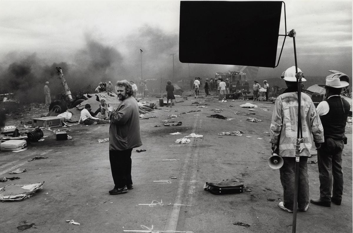 Daviau observes the scene while shooting a portion of the harrowing plane crash sequence in the drama Fearless (1993).