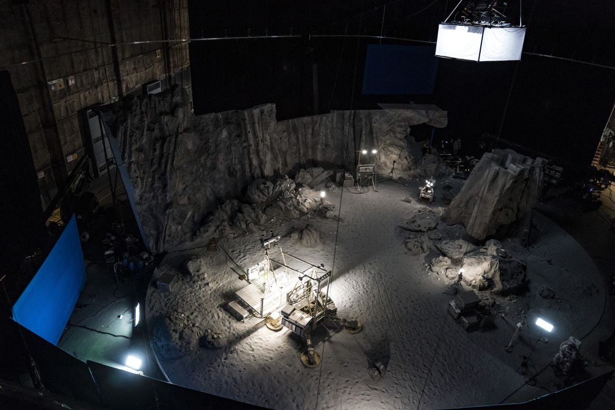 “Gaffer Keith Roverud and I put a 100K SoftSun on a lift, and then key grip Curt Griebel set out to design the massive hanging black material,” says McNutt. “They created a giant aperture surrounding the light that kept the spill off the walls and focused the light on the surface of the moon only.”