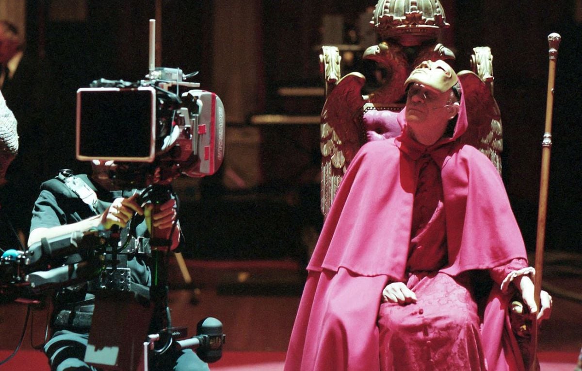 The man in the red cloak was played by Kubrick’s longtime assistant, Leon Vitale, as discussed in the exceptional documentary Filmworker (2017).