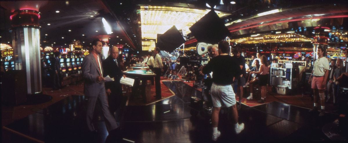 The crew sets up in the Riviera. To better control lighting in the gaming areas, extra bulbs and chrome-plated Par cans were added to existing overhead lighting bays, and the entire setup was controlled through a dimmer board. For wide shots of the casino floor, Richardson aimed Dinos and Maxis through muslin. The cinematographer also made extensive use of cutters to keep the reflective glare out of his lens.