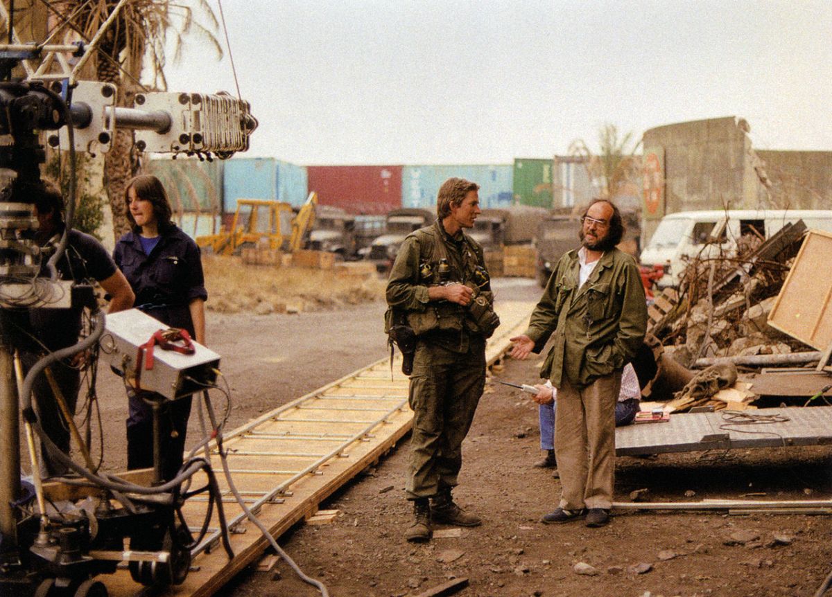 Kubrick confers with Modine as a dolly/crane setup is prepped. The actor's book Full Metal Jacket Diary (2005) is a first-person account of the production, with limited-edition copies now in high demand.