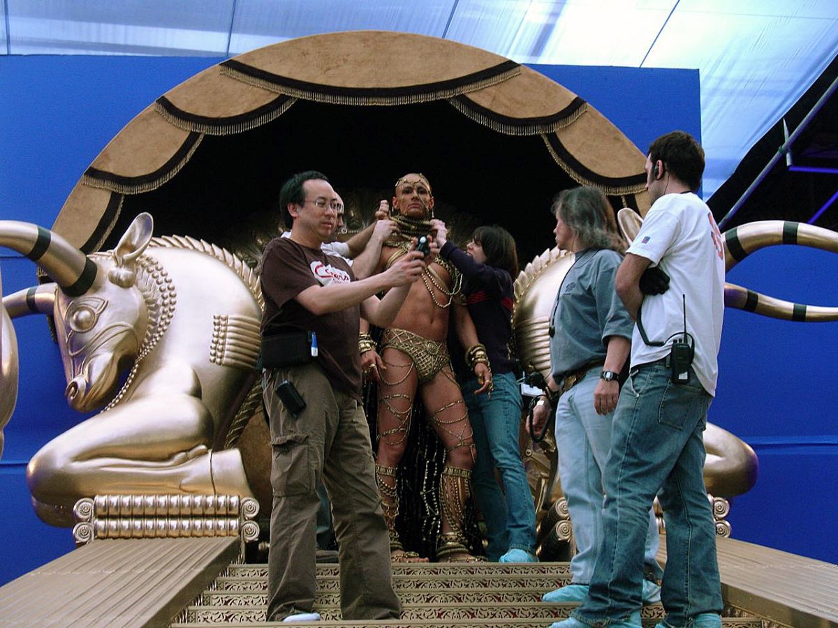 Fong checks his light as the team touches up the elaborate costume for actor Rodrigo Santoro, playing the ruthless, god-like Persian leader. (Photo by Jim Bissell)