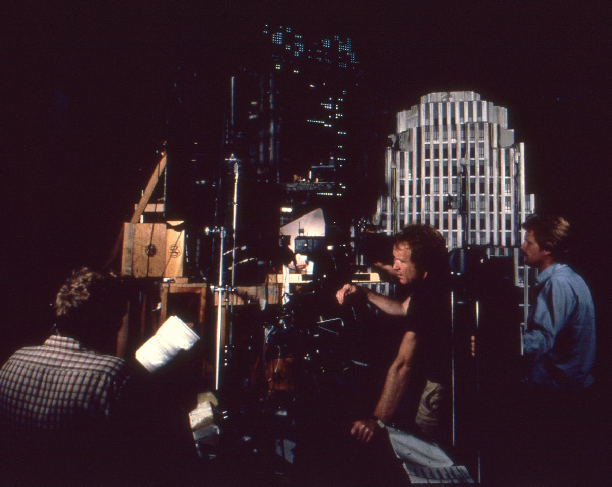 Ridley Scott (center) works with the model team.