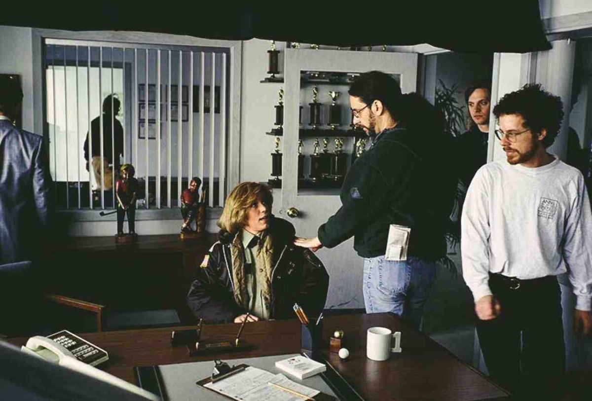 The Coens confer with actor Frances McDormand.