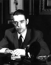 Turner (Mick Jagger)<br>dashes off a musical memo.